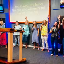 Worship team singing during church service